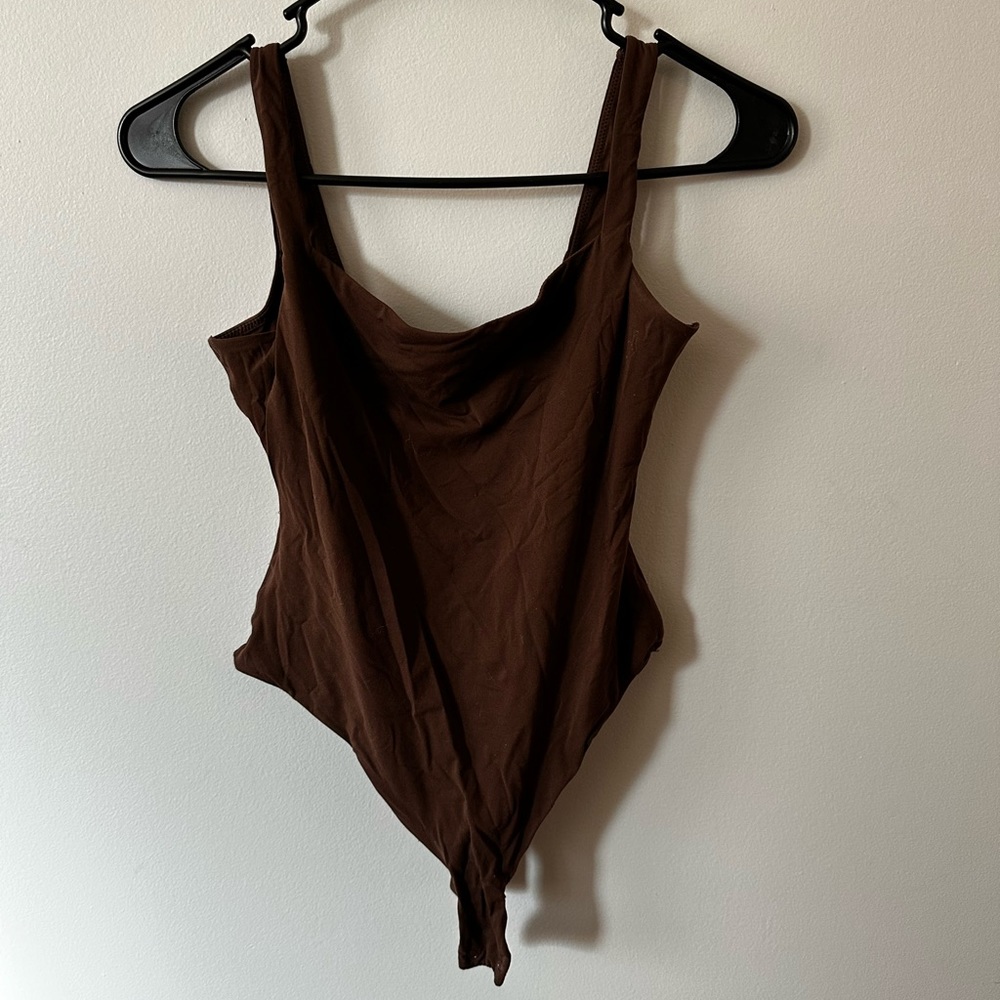Skims brown bodysuit. Worn a handful of times